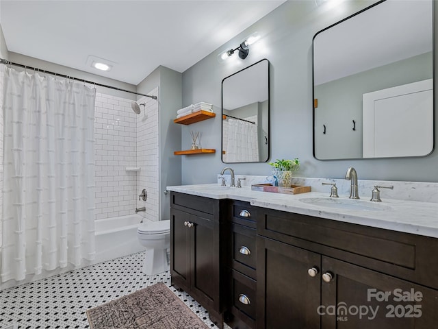 full bathroom with toilet, shower / tub combo, and vanity