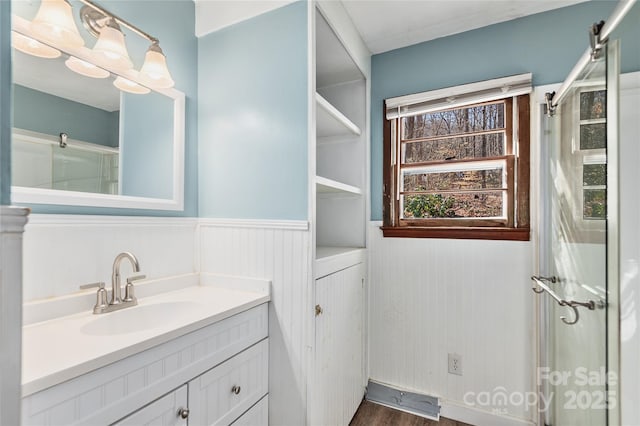 bathroom featuring vanity and wood-type flooring