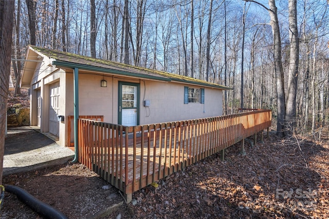 exterior space featuring a wooden deck