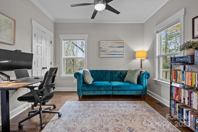 office area featuring ceiling fan, dark hardwood / wood-style floors, and ornamental molding