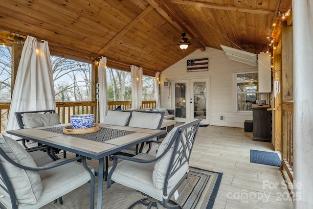 interior space featuring ceiling fan and french doors