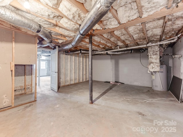 basement featuring water heater