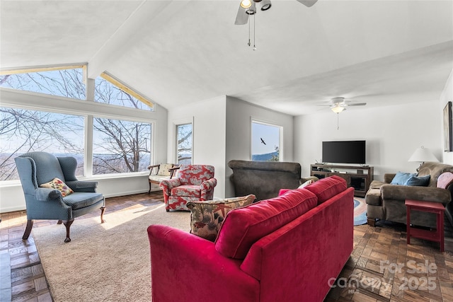 living room with vaulted ceiling with beams and ceiling fan