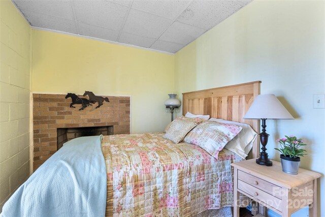 bedroom with a fireplace