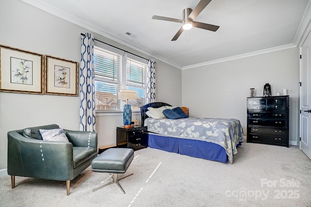 bedroom featuring a ceiling fan, carpet, visible vents, and ornamental molding