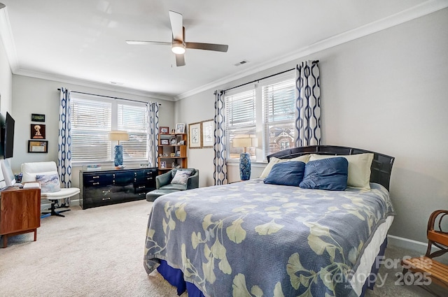 bedroom featuring carpet flooring, ceiling fan, and crown molding