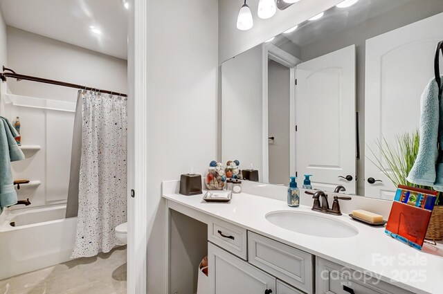 full bath featuring vanity, toilet, and shower / bath combo with shower curtain