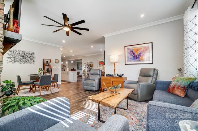 living room with recessed lighting, crown molding, a ceiling fan, and wood finished floors