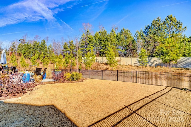 view of community featuring fence