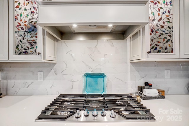 9428 Liberty Hill Dr, Mint Hill, NC 28227 - kitchen featuring stainless steel gas stovetop, backsplash, and light countertops