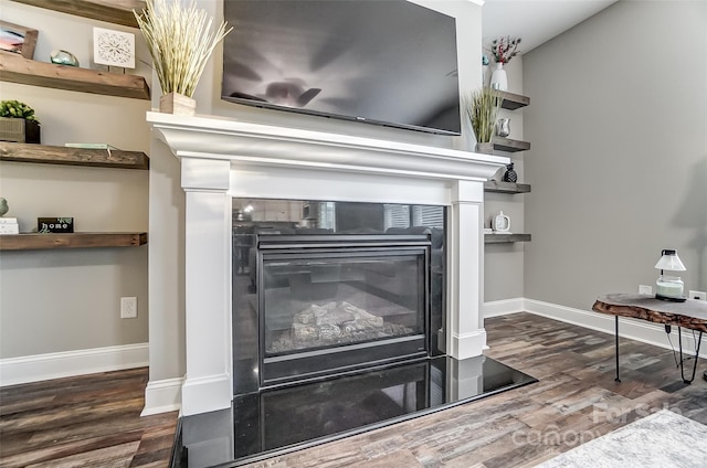 details with hardwood / wood-style flooring