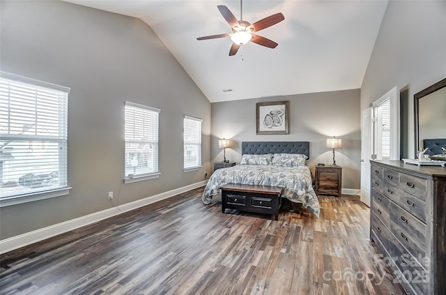 bedroom with dark wood-type flooring, high vaulted ceiling, and ceiling fan