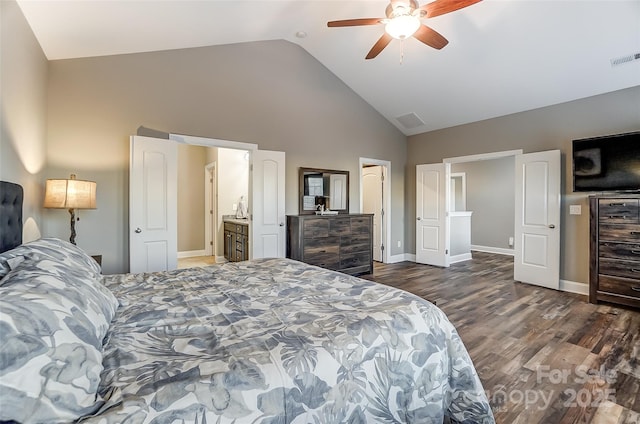 bedroom with high vaulted ceiling, dark hardwood / wood-style floors, ceiling fan, and ensuite bathroom