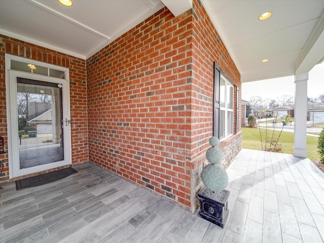 doorway to property with a porch