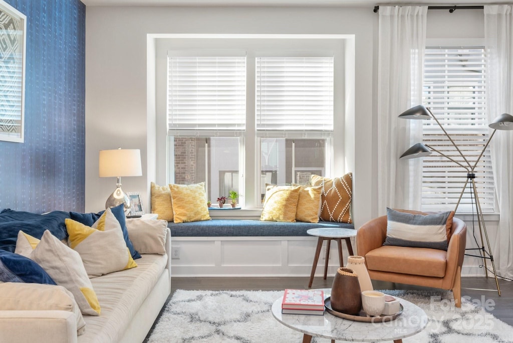 living room featuring hardwood / wood-style flooring and a wealth of natural light