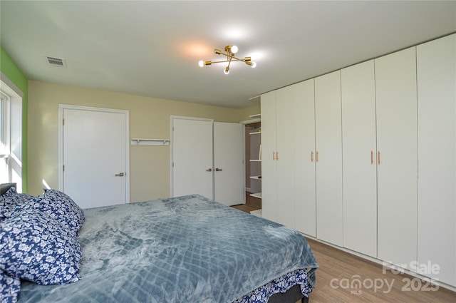 bedroom with hardwood / wood-style floors