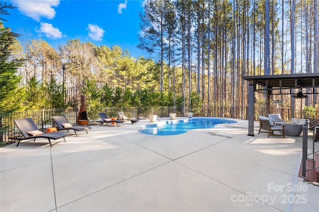 view of pool featuring a patio area and a gazebo