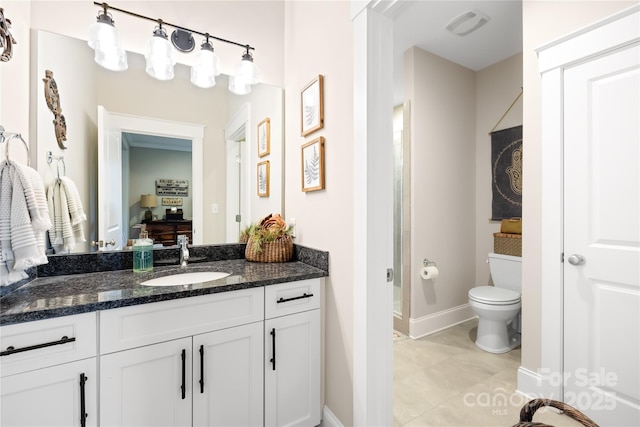 bathroom with tile patterned floors, toilet, and vanity