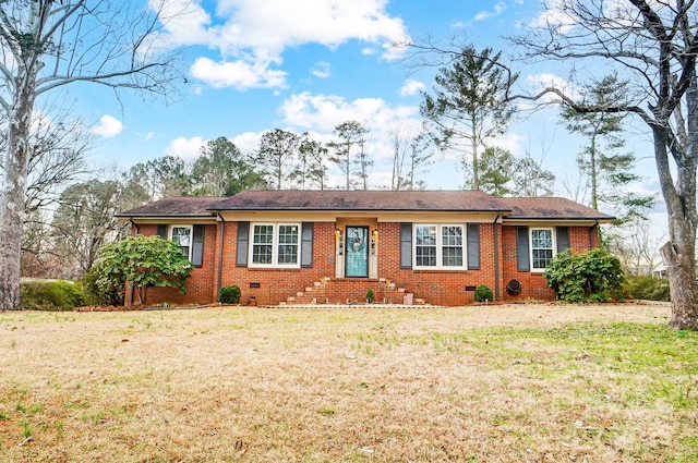 single story home featuring a front lawn