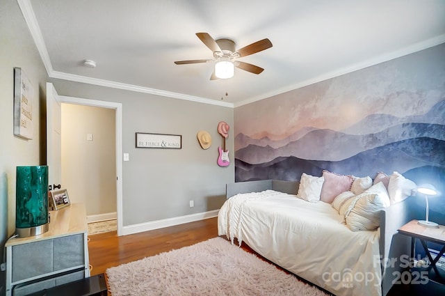 bedroom with hardwood / wood-style flooring, ceiling fan, and ornamental molding