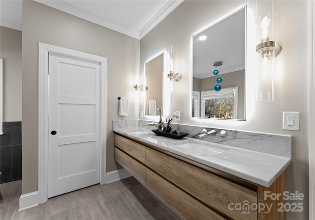 bathroom featuring vanity and crown molding