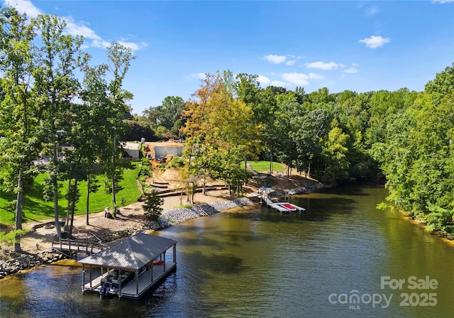 dock area featuring a water view