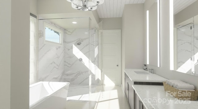 bathroom with vanity, separate shower and tub, and a notable chandelier