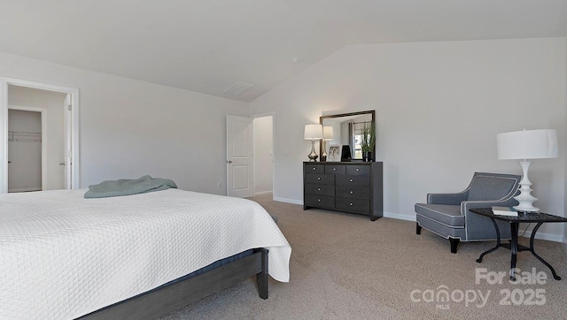 carpeted bedroom featuring vaulted ceiling