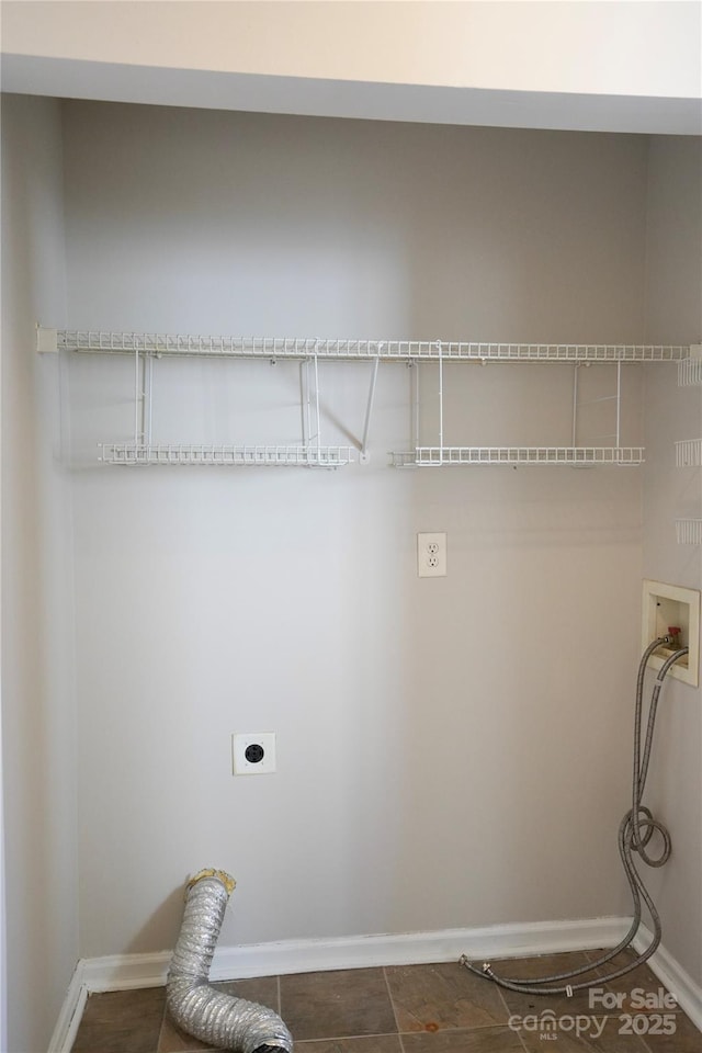 laundry room featuring electric dryer hookup and washer hookup