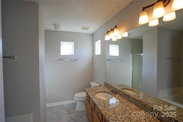 full bathroom featuring vanity, toilet, shower with separate bathtub, and a textured ceiling