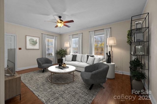535 5th St, Chester, SC 29706 - living room featuring baseboards, ceiling fan, ornamental molding, and dark wood finished floors