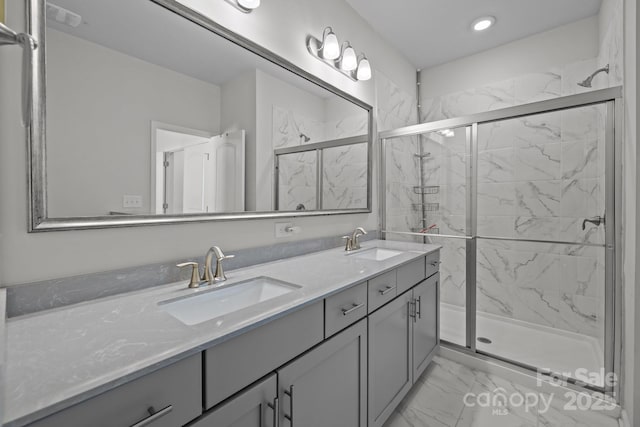 bathroom with vanity and walk in shower