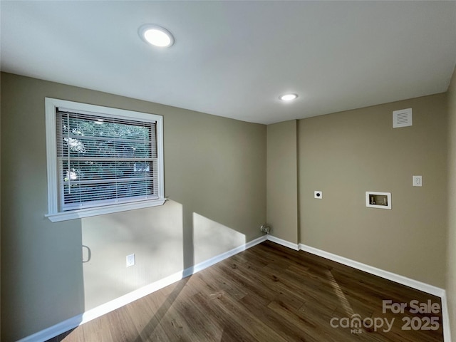 clothes washing area with dark hardwood / wood-style flooring, hookup for a washing machine, and hookup for an electric dryer