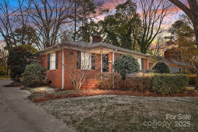 view of property exterior at dusk