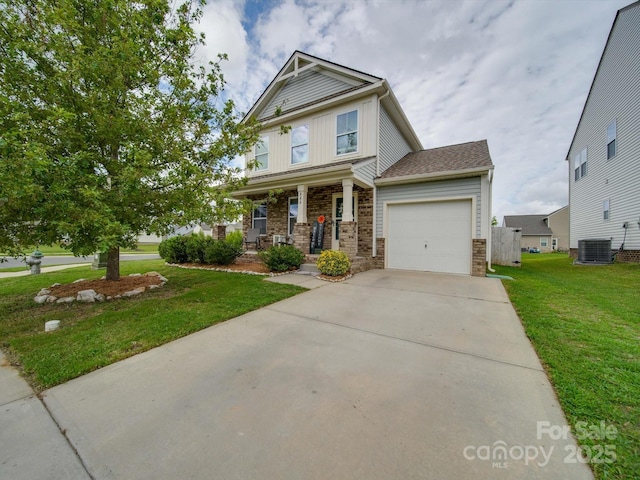 craftsman-style home featuring central AC, a garage, covered porch, and a front yard