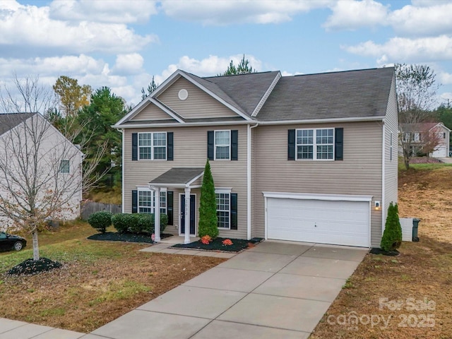 view of front of property with a garage