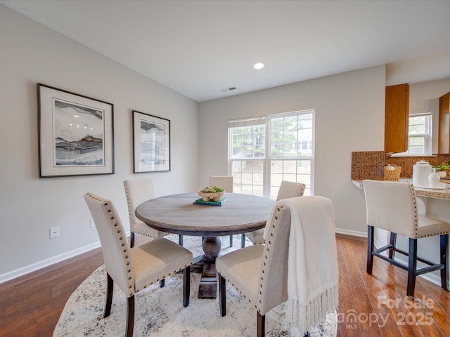 dining area featuring hardwood / wood-style flooring