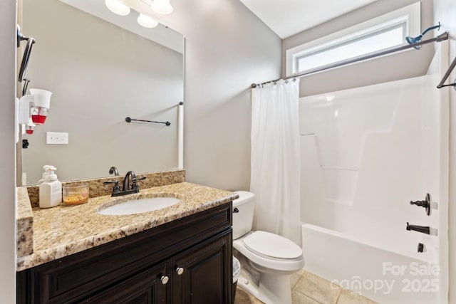 bathroom featuring toilet, tile patterned flooring, shower / bath combo with shower curtain, and vanity