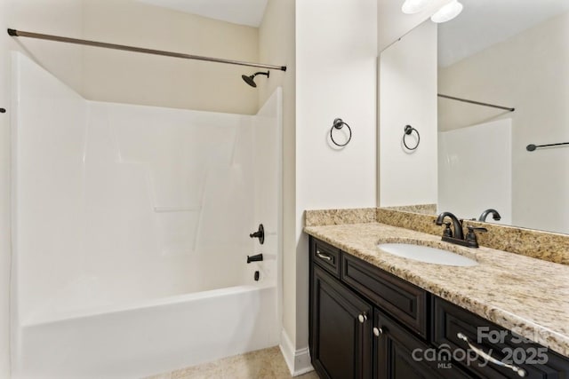 full bath with shower / washtub combination and vanity