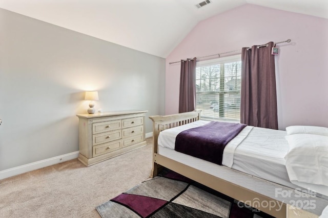 bedroom featuring visible vents, vaulted ceiling, light carpet, and baseboards