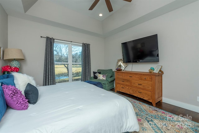 bedroom featuring ceiling fan and dark hardwood / wood-style floors