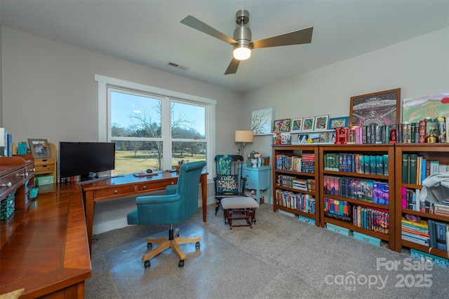 office with ceiling fan and carpet