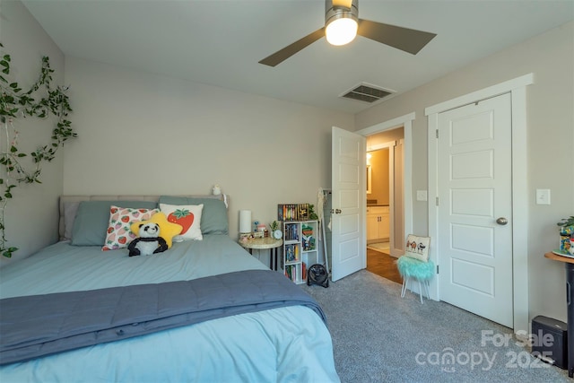 carpeted bedroom with ceiling fan