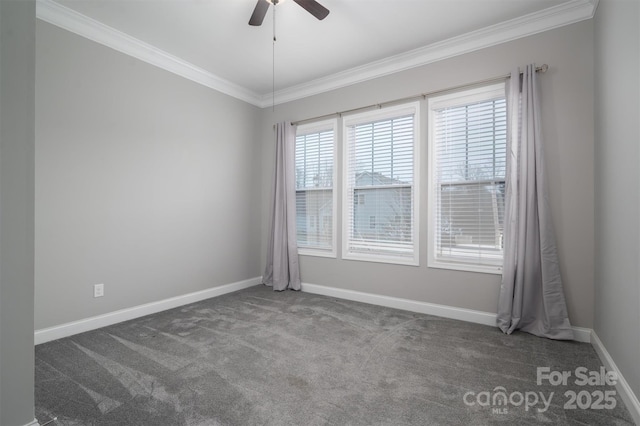 carpeted empty room with ceiling fan and ornamental molding