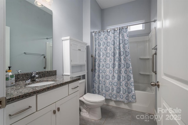 full bathroom featuring shower / bath combo with shower curtain, toilet, tile patterned flooring, and vanity