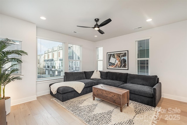 5048 York Park Ln, Charlotte, NC 28217 - living room with baseboards, visible vents, and light wood-style floors