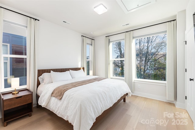 5048 York Park Ln, Charlotte, NC 28217 - bedroom featuring baseboards, visible vents, and light wood-style floors