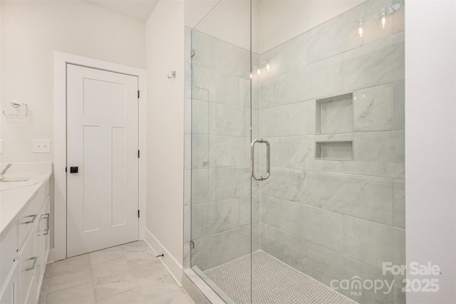 5048 York Park Ln, Charlotte, NC 28217 - bathroom with marble finish floor, vanity, and a stall shower