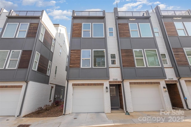 5048 York Park Ln, Charlotte, NC 28217 - view of property with brick siding and an attached garage