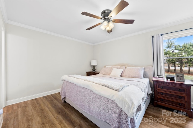 bedroom featuring crown molding, hardwood / wood-style floors, and ceiling fan